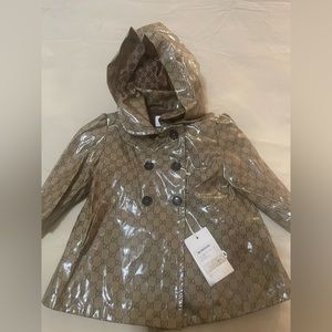 Gucci baby rain coat 6-9 months